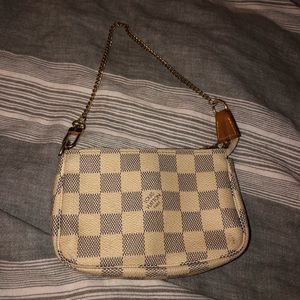 Authentic Louis Vuitton Mini Pochette